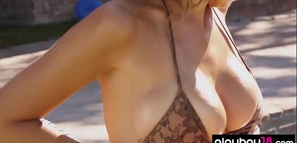  Hot bikini babe oiling her big boobs and perfect body